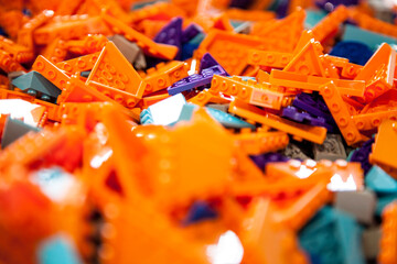  A pile of colorful interlocking building blocks typically used as children&rsquo;s educational and developmental toys.