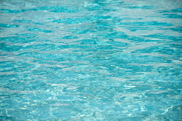 Pool water background, blue wave abstract or rippled water texture background.