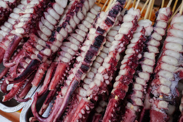 Barbecue ingredient squid leg, close-up photo