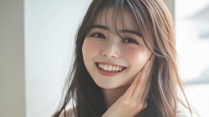 Naklejka premium Young Woman With Long Hair Smiling Brightly While Posing Indoors During Daylight Hours