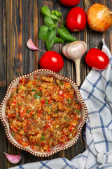 Appetizer of finely chopped baked vegetables.