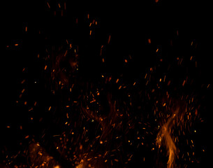 fire flame with sparks on black background.
