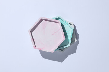 Hexagonal plaster trays on white background. Top view