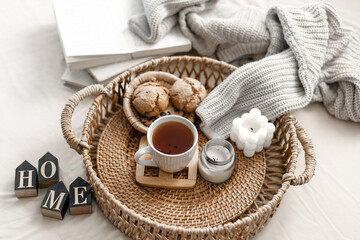 Cozy composition with the inscription home. Home coziness and comfort