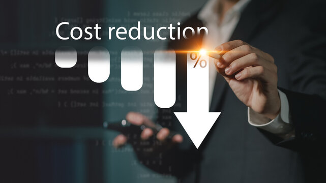 Cost reduction business finance concept, budget management and cost management. Businessman show Cost reduction graph with down arrow on virtual screen.