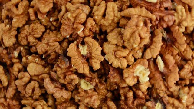 Walnuts rotate. View from above. Close-up