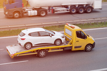 Flatbed Tow Truck Assistance On Intercity Highway