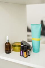 Close up of body care cosmetic products on shelf in cosmetology. Spa and piling cosmetics