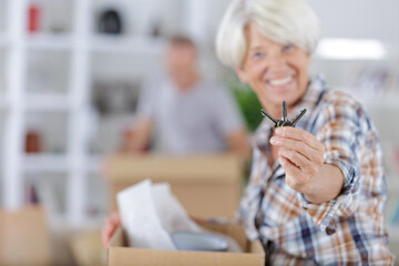 senior woman showing the keys