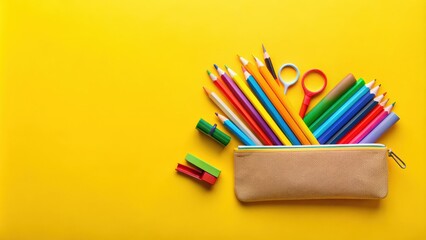 Fototapeta premium Pencil case with school supplies on yellow background. Back to school concept. Flat lay