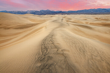 Landscape at sunrise of the Mesquite Flat Sand Dunes and Panamint Mountains, Death Valley National...