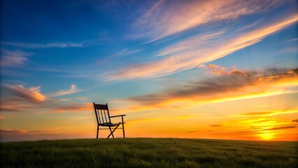 Serene Sunset Silhouette: A solitary chair overlooking a vibrant sunset, casting a long shadow across the horizon.  Generative AI
