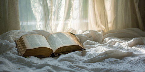 Open Book Resting on White Bedding near Window.