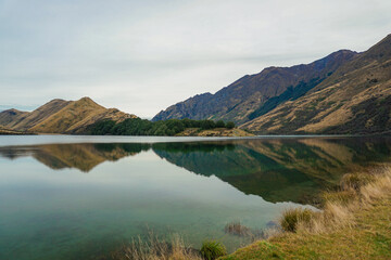 Winter Majesty Snow-Capped Peaks, Reflective Lakes, and Scenic Views of Queenstown and Coronet Peak New Zealand South Island Nature