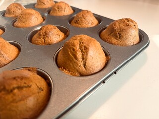 Freshly baked muffins on the table.