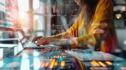 A woman sits at a desk working on her laptop, with a data visualization overlay on the screen, symbolizing technology, data analysis, progress, innovation, and future.