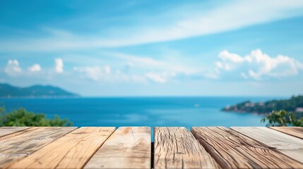 Fototapeta premium Wooden table top overlooking a stunning blue ocean and cloudy sky.