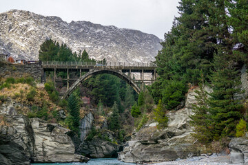 Fototapeta premium Queenstown in winter: Snow-covered peaks, frosted landscapes, and stunning alpine views create a breathtaking winter wonderland in New Zealand’s South Island the remarkable, coronet peak, crown range