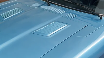 Fototapeten Vintage Auto Vents on a car hood  © Josh Bryan