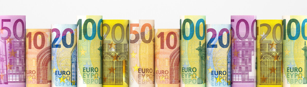 Rolled euro banknotes in various denominations arranged in a row on a white background.
