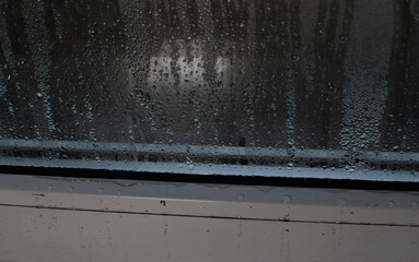 drops on the window glass. condensation due to high humidity