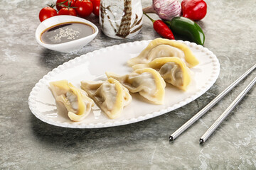 Japanese cuisine - dumplings gyoza with sauce