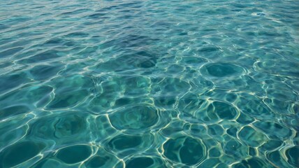 Fototapeta premium turquoise sea water surface with ripples and waves, background