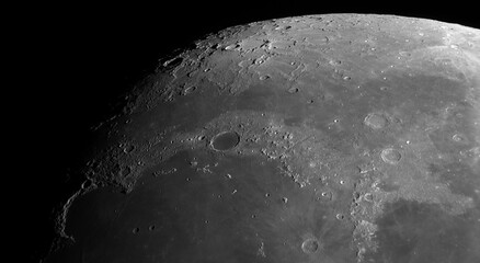 Photo of the moon's surface through a telescope. © Sergei