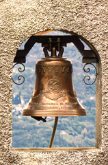 Fototapeta premium A bell on a mountain church in the province of Como.