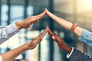 Teamwork, roof and hands of business people in office for collaboration, connection and support. Corporate, diversity and workers for security, cooperation and partnership in insurance company © JordaanExams/peopleimages.com