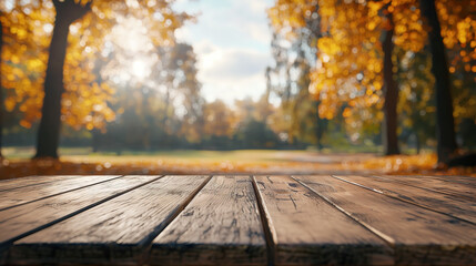 Beautiful autumn background with a wooden table for product display presentation mock up and a blur forest in the park background 