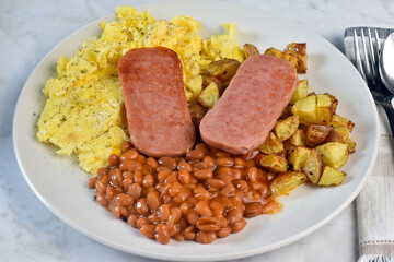 scramble eggs with fried spam and  baked  beans