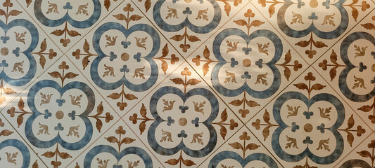 decorative blue and yellow Portuguese flooring, illuminated by the sun