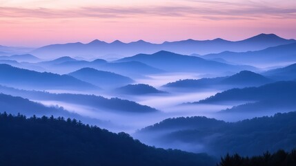 Fototapeta premium Serene Landscape of Foggy Mountain Range at Dawn with Soft Pastel Colors and Layered Peaks
