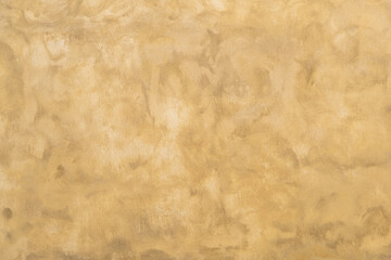 ancient antique wall is covered with a protective layer of plaster and painted with faded patterns. vintage wallpaper in interior or exterior design.