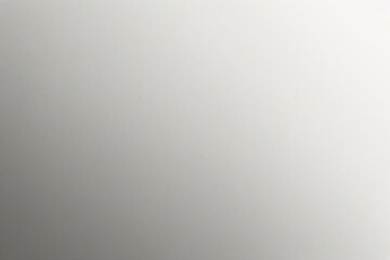 マットグレーの滑らかなプラスチックの表面に細かい質感があり、右側にビネットが付いています。絶妙なテクスチャ背景、柔らかい空白の背景	