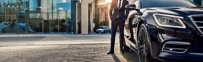 Personal driver waiting for his client.