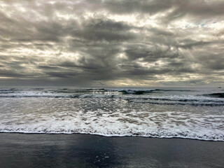 A Stormy Cloudy Sky Over The Calm Waves On The Ocean Of Kalaloch In Washington State