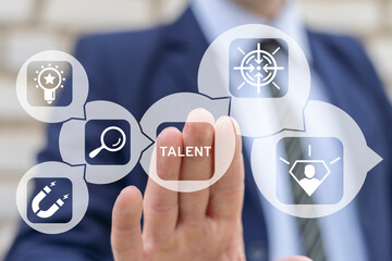 Business man working on virtual touch screen presses word: TALENT. Talent Acquisition Business...