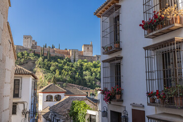 The Alcazar of the Alhambra seen from the Albaicin neighborhood of Granada.