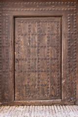 An old wooden door in the Albaicin area of Granada.