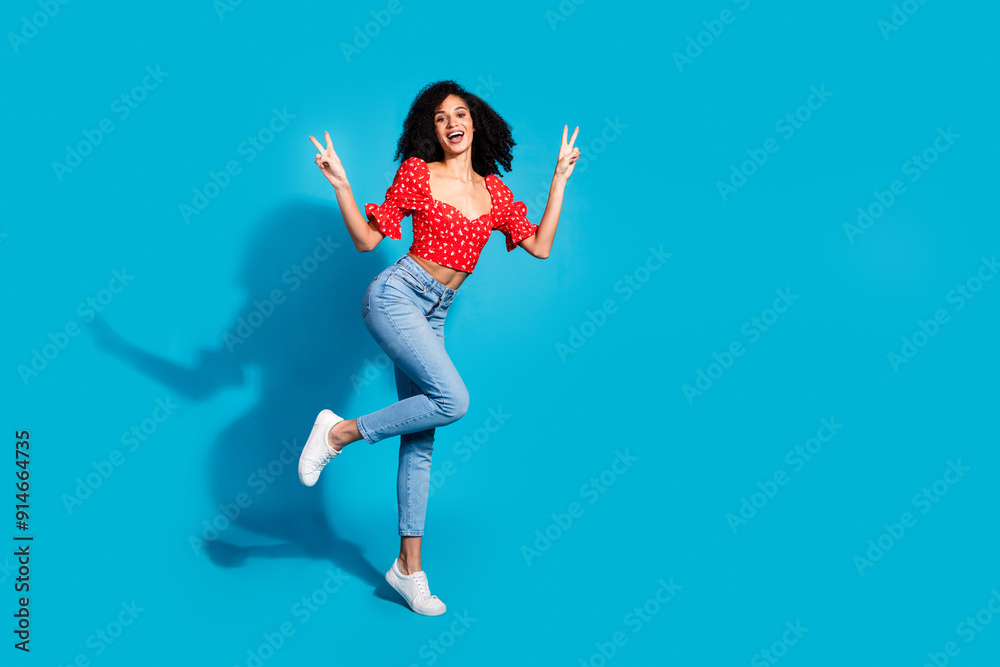 Sticker Full size photo of pretty young woman v-sign empty space wear top isolated on blue color background