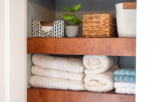 Neatly organized small bathroom closet