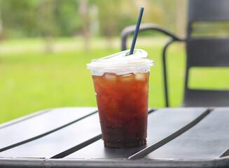 cup of iced coffee on table.