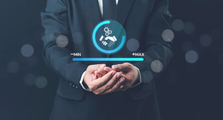 Trusted partner. Trustworthy collaboration, company or contract. Confidence to work together. Businessman turning knob to highest trust levels. Build trust in business and finance relationships.