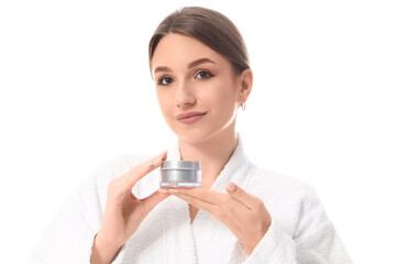 Beautiful young woman with jar of cosmetic cream on white background