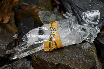 Broken part of the bottle.