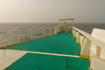 View of the bridge wing of a ship at sea