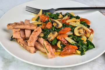 sauteed spinach   dish served with  spam fries
