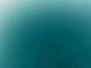 Aerial view of sea surface in the sunrise